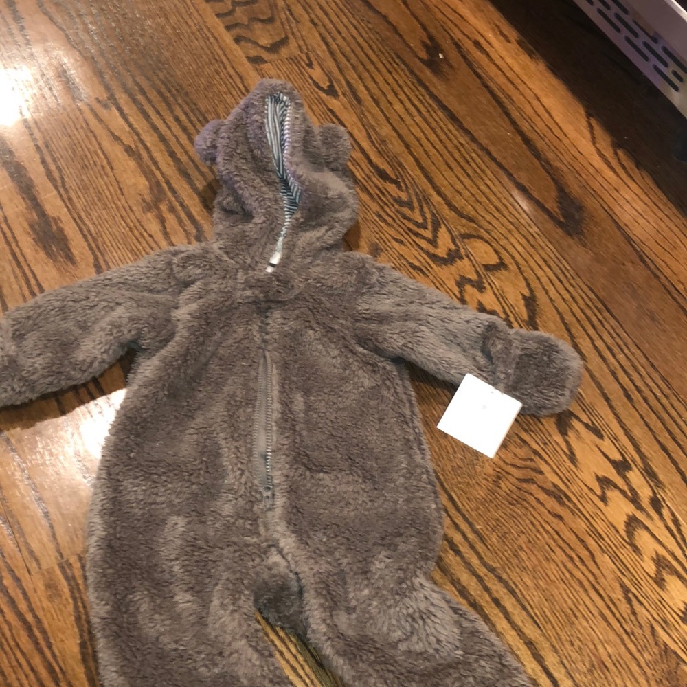 Baby heavy one piece brand new